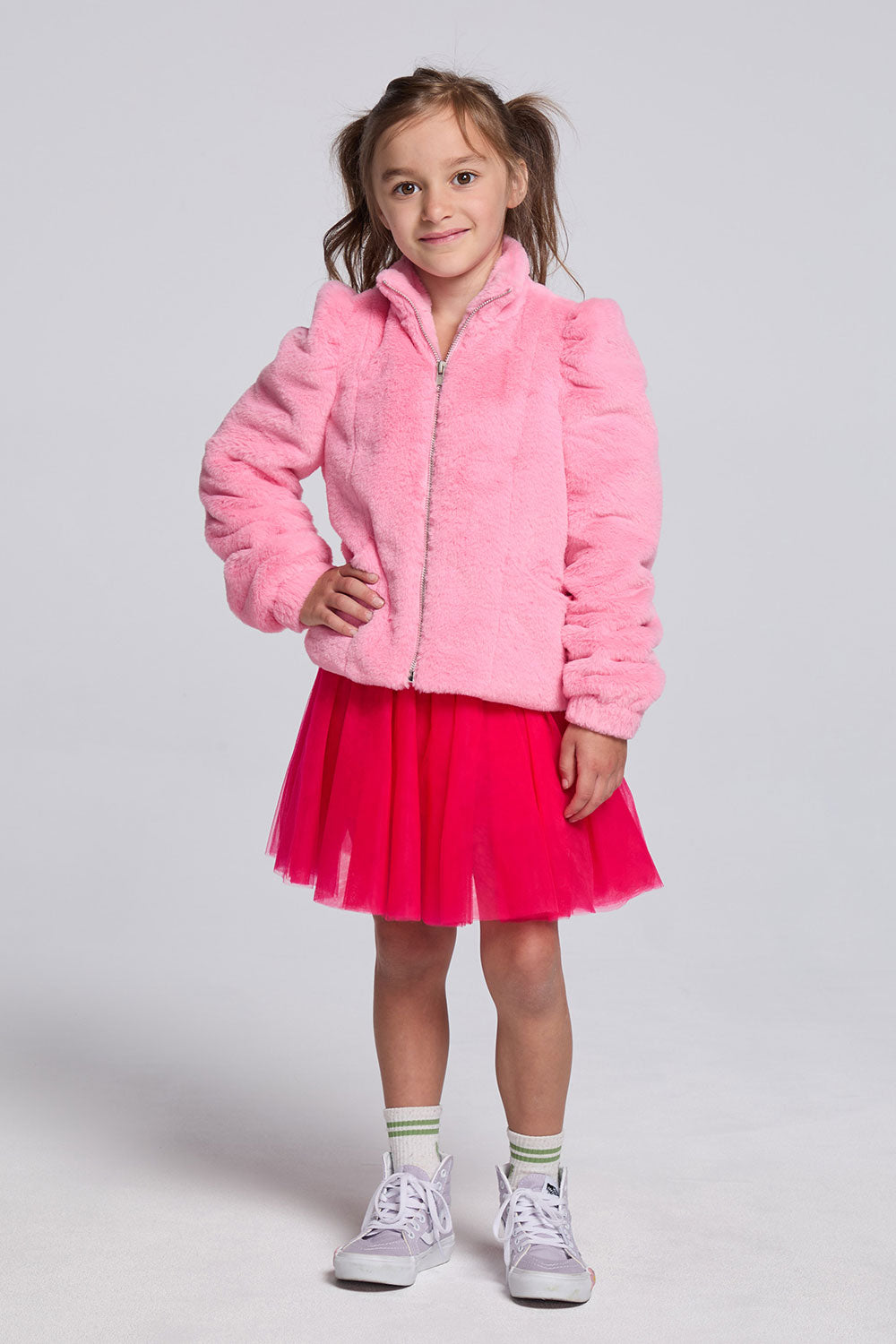 Chaser Kids Camelia Girls Puff-Sleeve Jacket in pink worn with a pink skirt, full-body front view against a light gray studio background