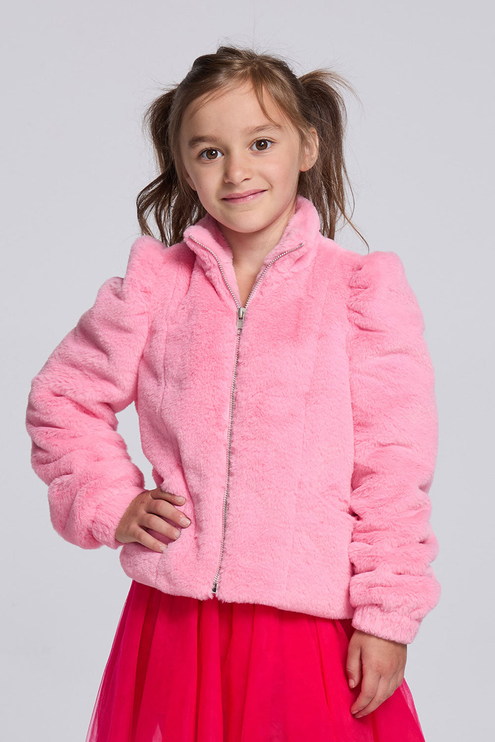 Chaser Kids Camelia Girls Puff-Sleeve Jacket in pink plush fabric with a front zipper, front view against a light gray studio background