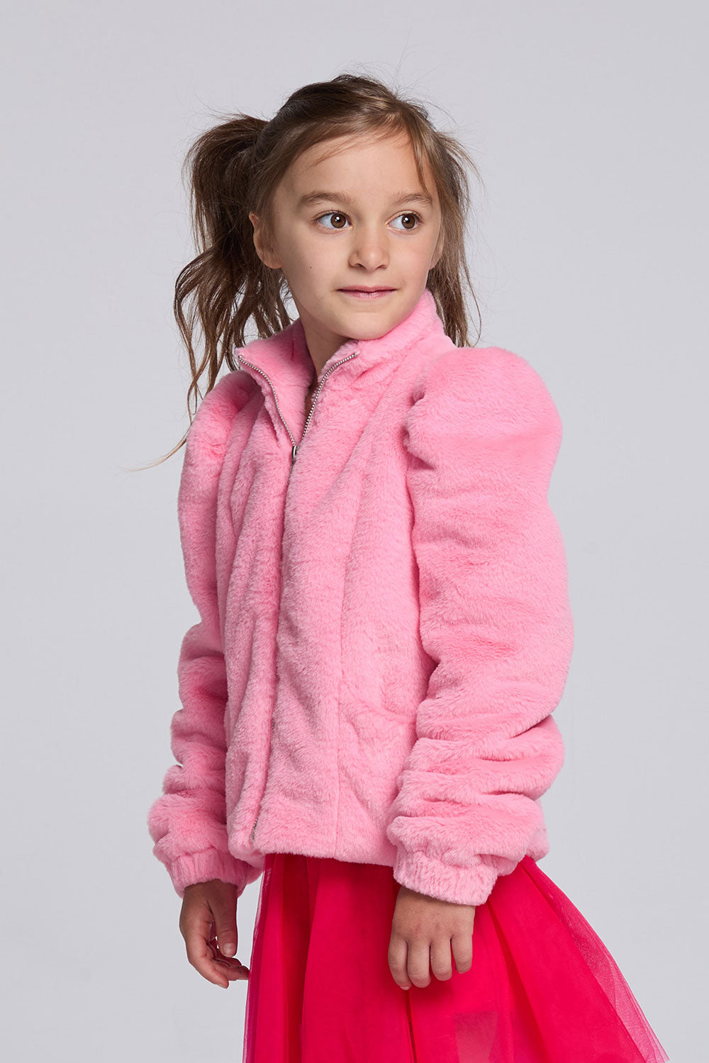 Chaser Kids Camelia Girls Puff-Sleeve Jacket in pink plush fabric, front three-quarter view against a light gray studio background