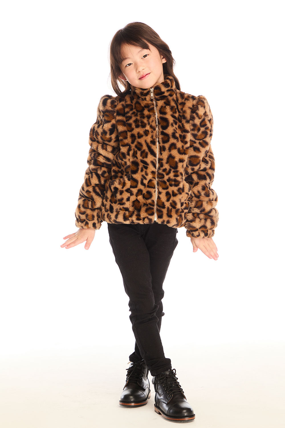 Full body view of girl wearing Chaser’s Puff Sleeve Leopard Love Jacket with black jeans and boots on a white background