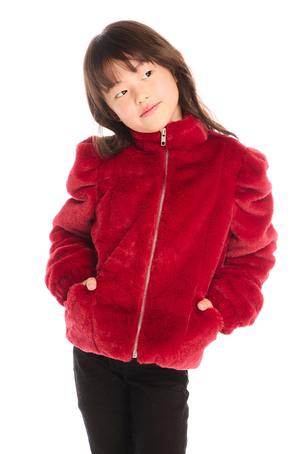 Girl wearing Chaser’s Puff Sleeve Rouge Jacket on a white background