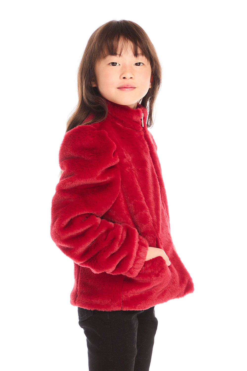 Side view of girl wearing Chaser’s Puff Sleeve Rouge Jacket on a white background