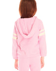 Back view of girl wearing Chaser's Cropped Shirred Confetti Pullover pink Hoodie and matching pants on a white background