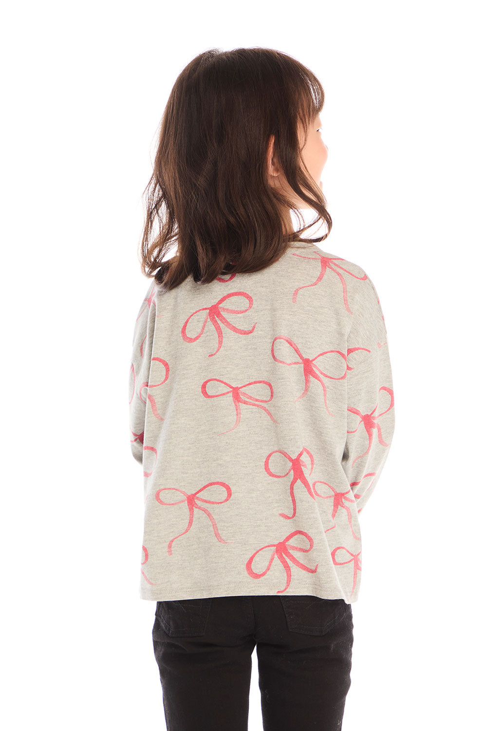 Back view of girl wearing Chaser’s gray Red Bows Long Sleeve with pink bow pattern on a white background