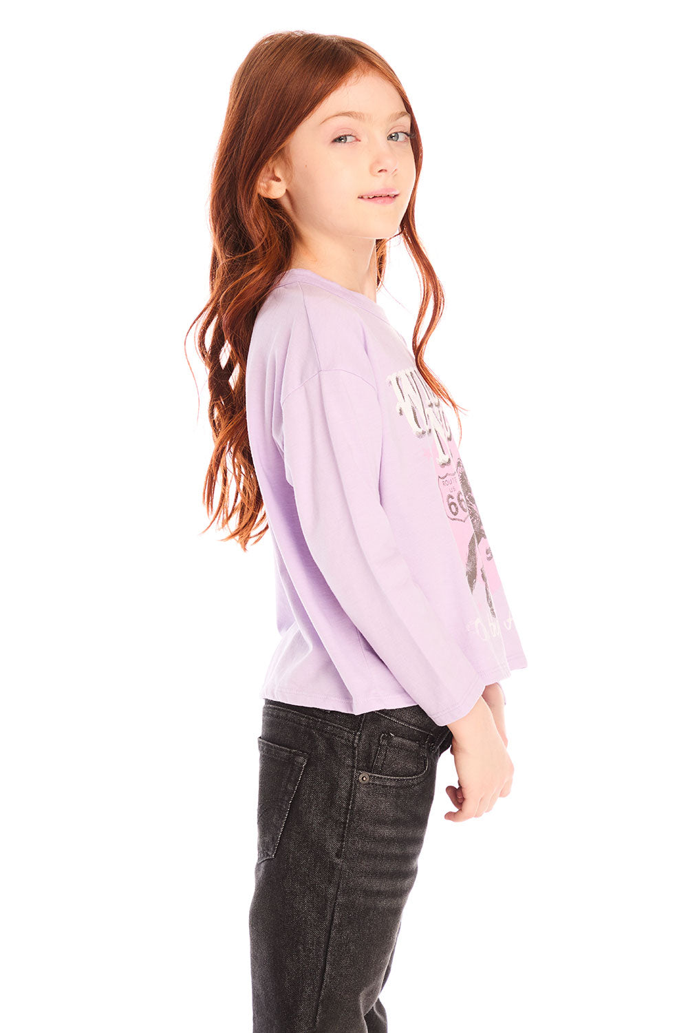 Side view of girl wearing Chaser’s pink Willie Nelson Lady Luck Tee with text and graphics on a white background