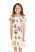 Girl wearing the Chaser Kids Back To School Doodles Dress in Stylish White featuring colorful doodle graphics including hearts, strawberries, peace signs, and smiley faces on a white background