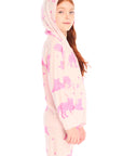Side view of girl wearing Chaser’s Celestial Tigers Zip Up Hoodie with pink animal pattern and hood up on a white background