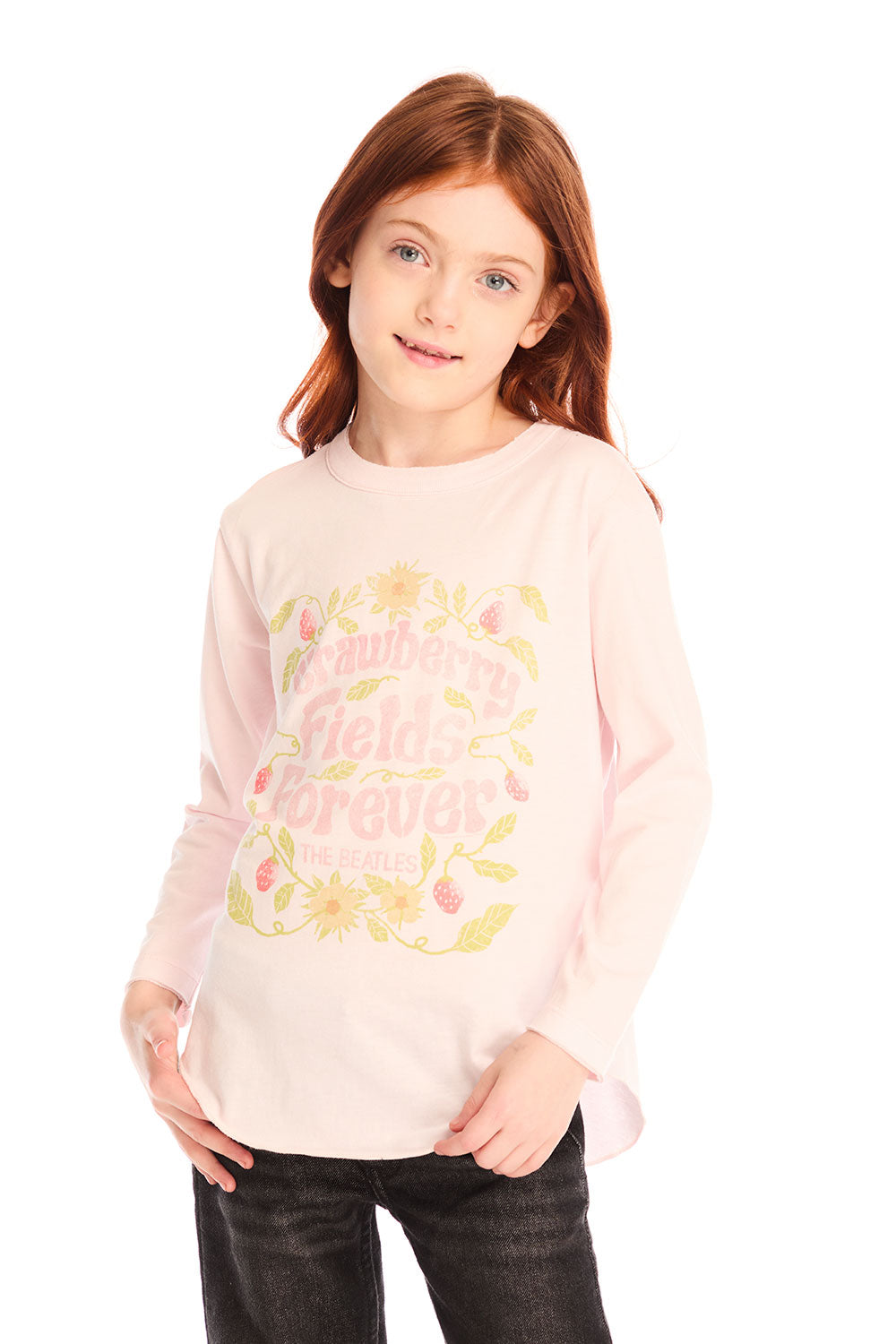 Girl wearing Chaser’s light pink The Beatles Strawberry Fields Forever Long Sleeve with floral design on a white background
