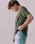 Side view of vintage-style Locals Only tee in Backwoods Green.