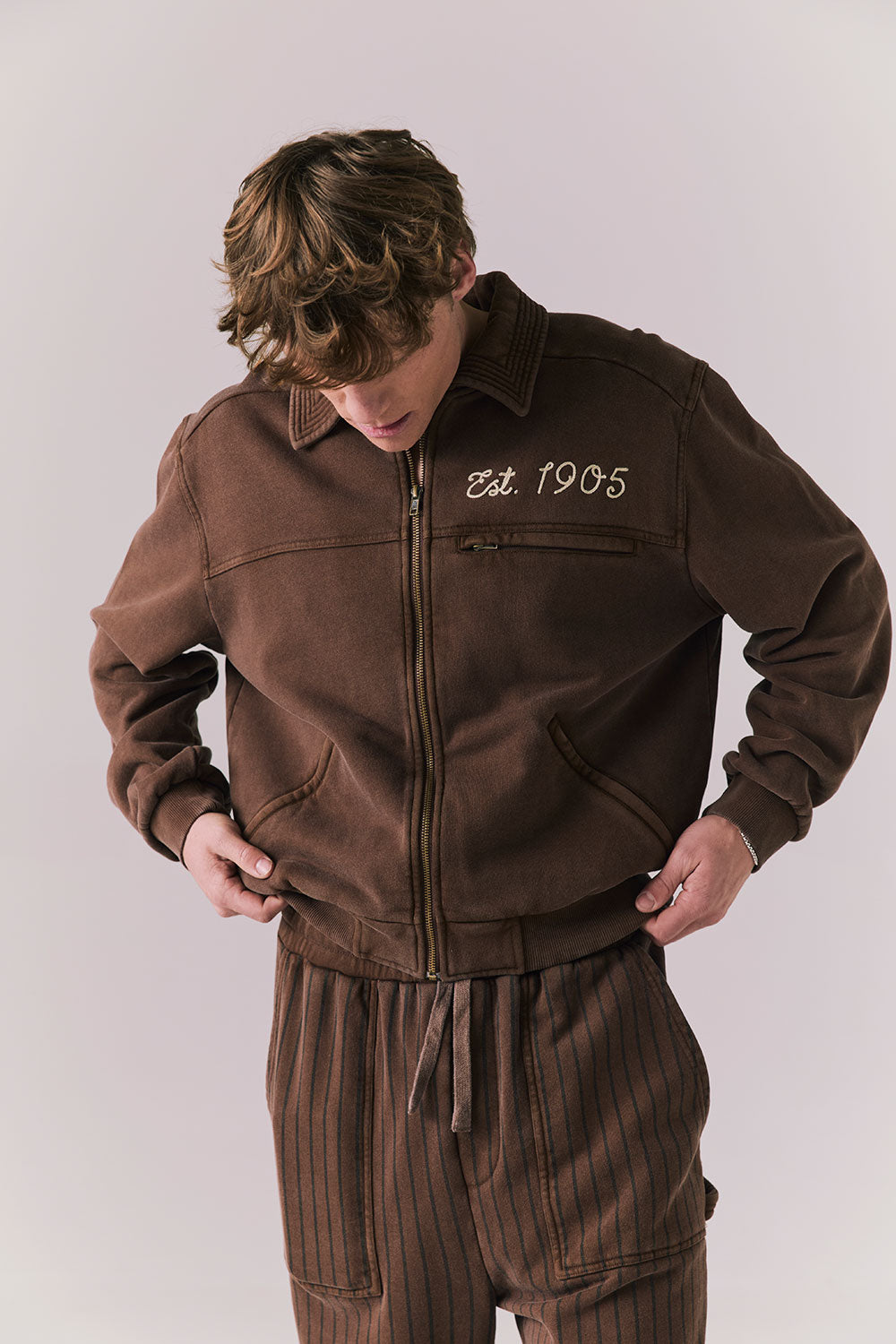 Front view of Est. 1905 Jacket in Kulaha Brown with varsity-style detailing.