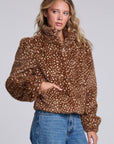 Model wearing Chaser's Baby Deer Puff Sleeve Jacket in warm brown spotted faux-fur texture with oversized puff sleeves, angled view