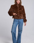 Model wearing Chaser's Dark Chocolate Puff Sleeve Jacket in deep brown plush faux-fur texture with oversized puff sleeves, full-body view