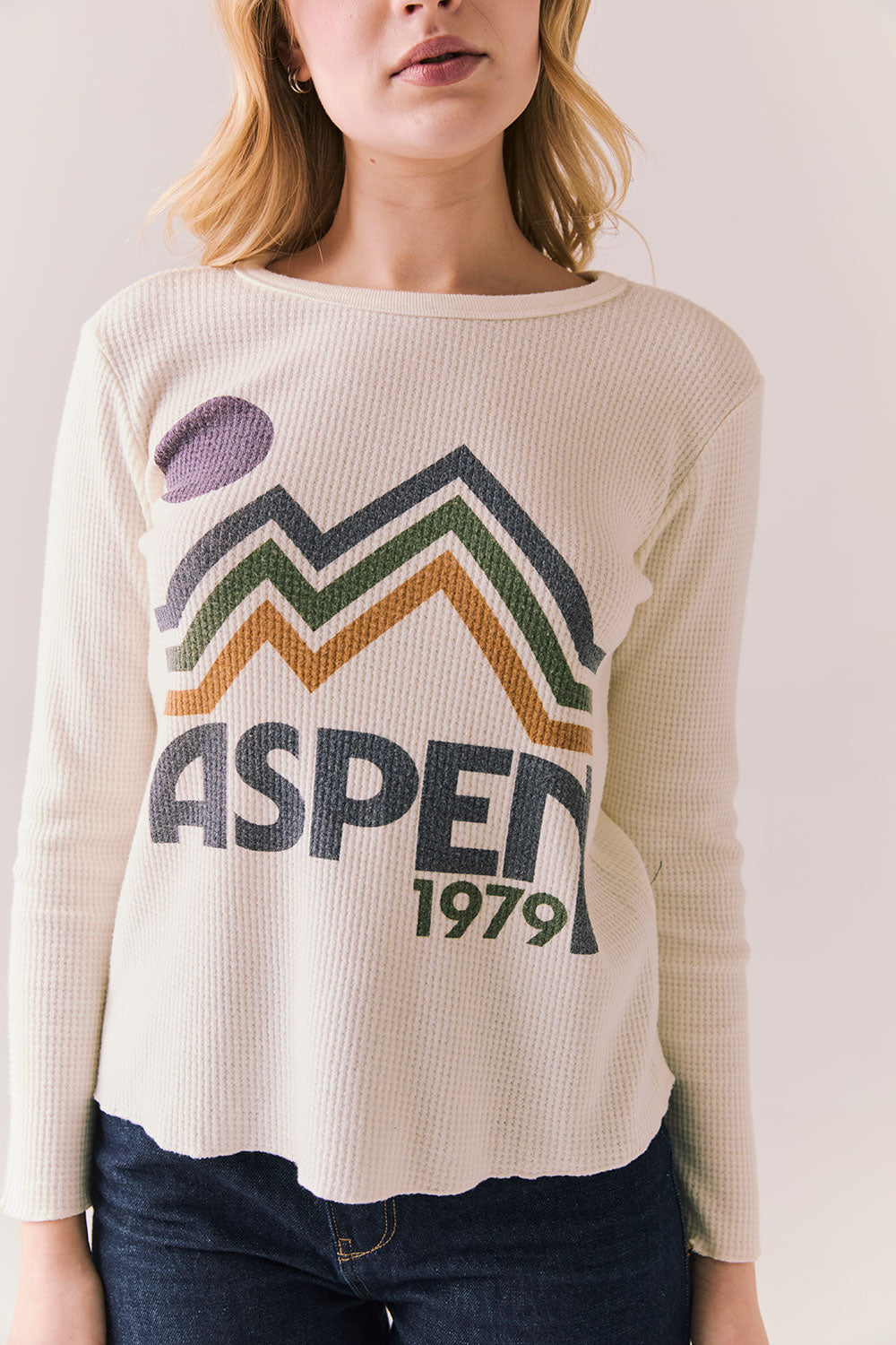 Front view of model wearing Aspen 1979 Long Sleeve in white