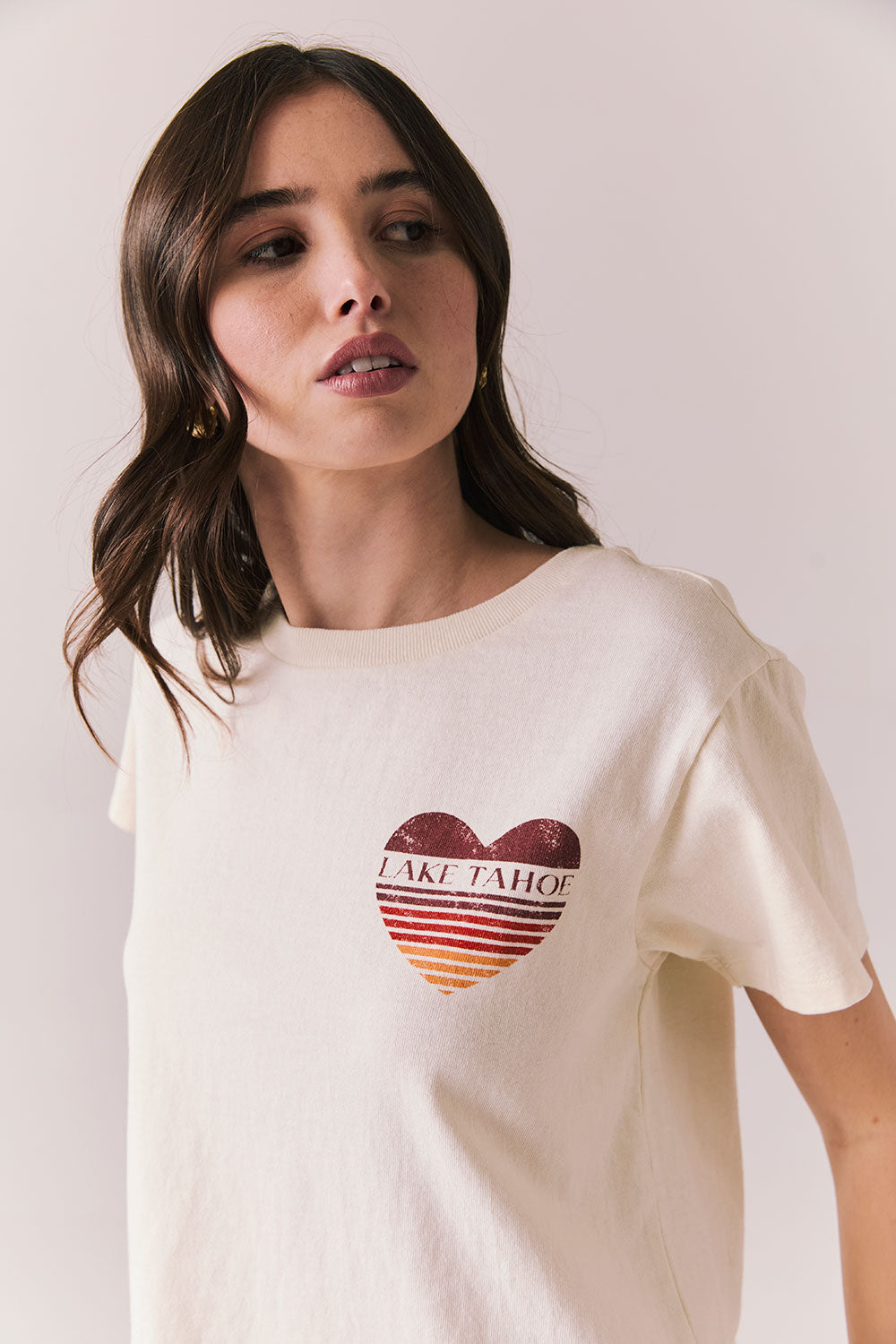 Front view of Lake Tahoe Ombre Tee in starry white with soft gradient fade, heart-shaped graphic design, and relaxed silhouette on a plain background