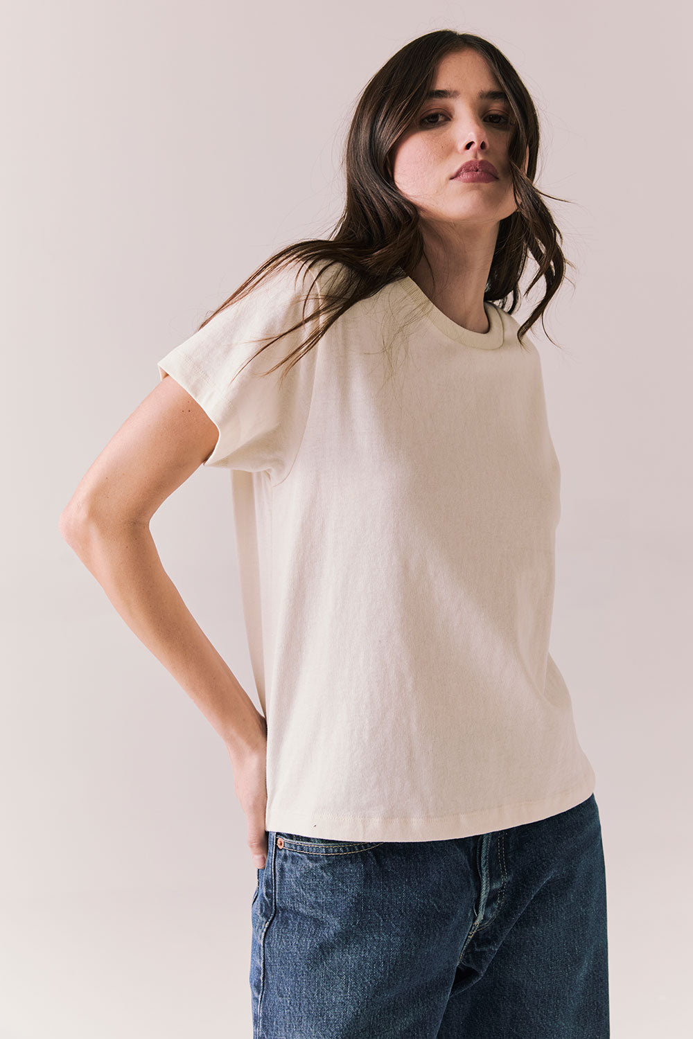 Side view of Rambler Starry White Tee with ringer neck and cap sleeves on a plain background