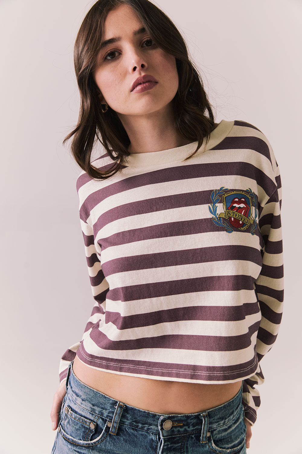 Front view of The Rolling Stones Rugby Stones Logo Long Sleeve with red and white stripes, cropped fit, and tongue logo graphic against a plain background