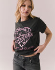 Side view of Blondie Heart of Glass black t-shirt with pink text and design on a plain background