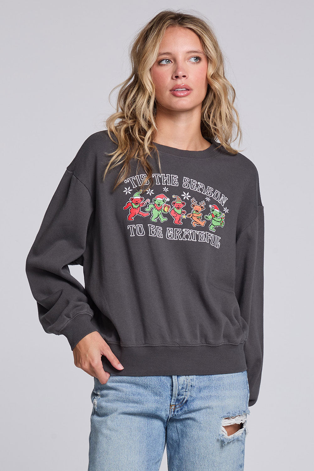 Model wearing Chaser's Grateful Dead 'Tis the Season Pullover in Fresh Gravel with colorful Grateful Dead holiday artwork, front view