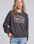 Model wearing Chaser's Grateful Dead 'Tis the Season Pullover in Fresh Gravel with colorful Grateful Dead holiday artwork, front view