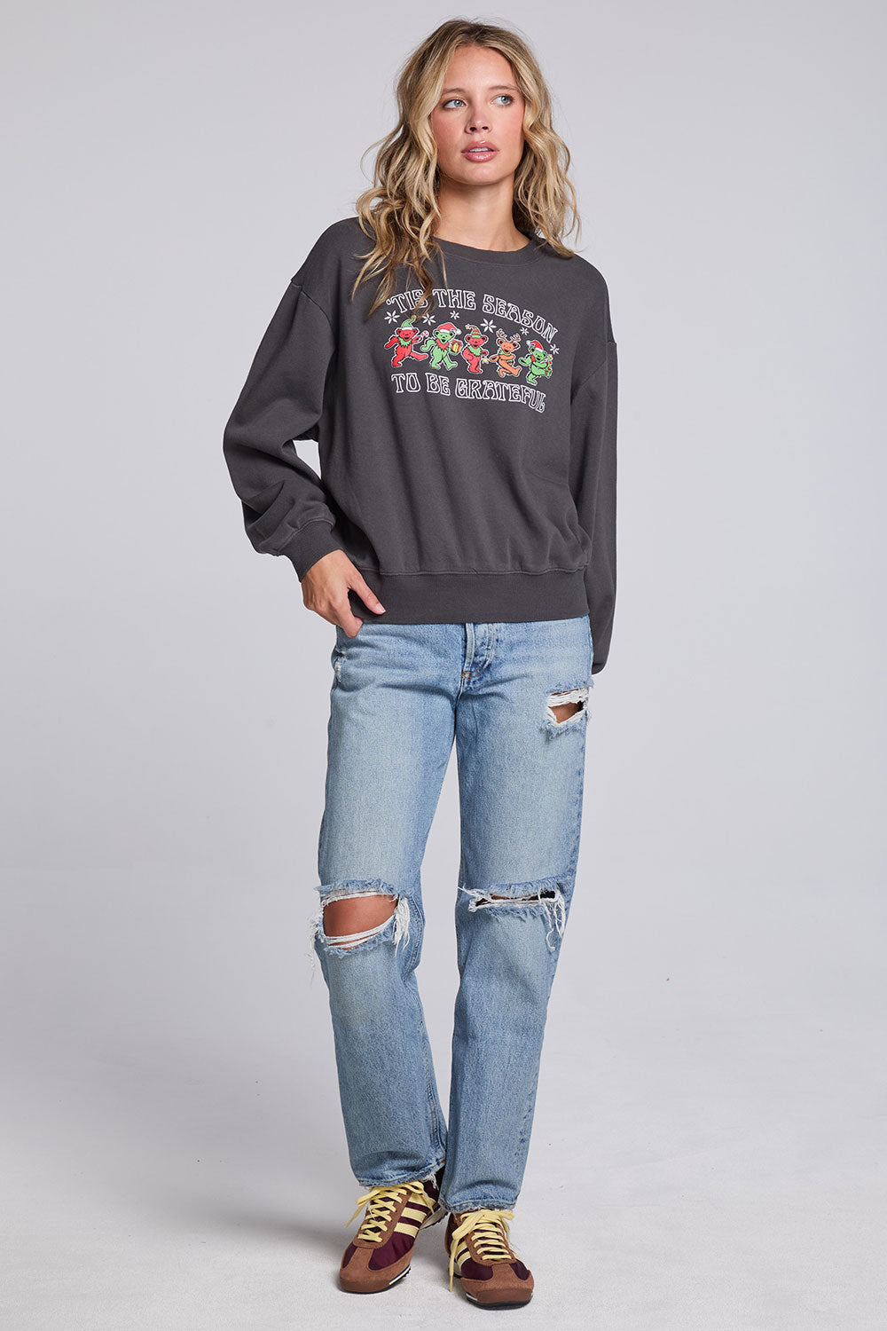 Model wearing Chaser's Grateful Dead 'Tis the Season Pullover in Fresh Gravel with colorful Grateful Dead holiday artwork, full-body view