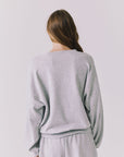 Back view of the Chaser Ain’t My First Rodeo Long Sleeve in Heather Grey