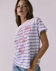 Angled front view of the Chaser La Dolce Vita Tee showing the strawberry graphic and blue stripe pattern