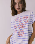 Close up view of the Chaser La Dolce Vita Tee highlighting the strawberry illustration and Italian graphic text