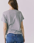 Back view of the Chaser Home Run Tee in Heather Grey with a clean solid finish and casual everyday silhouette