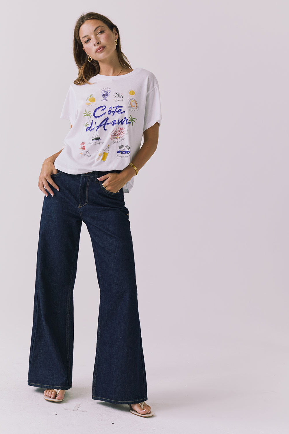 Chaser Costa Del Sol Tee in White styled with denim for an effortless everyday look