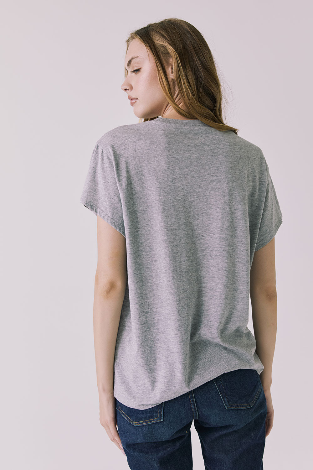 Back view of the Chaser Woodstock 1969 New York Tee in Heather Grey showing a clean solid back and easy everyday fit