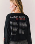 Back view of AC/DC UK Tour ’80 Tee in True Black with vintage UK Tour 1980 poster graphic and cropped long-sleeve fit on plain background