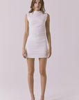 Full body view of the Chaser Hailey White Top styled with the matching Rue Skort creating a sleek coordinated set with a modern minimal feel