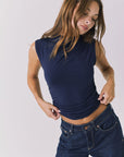 Chaser Hailey Navy Top shown from the front with a sleek sleeveless silhouette soft drape and clean high neckline