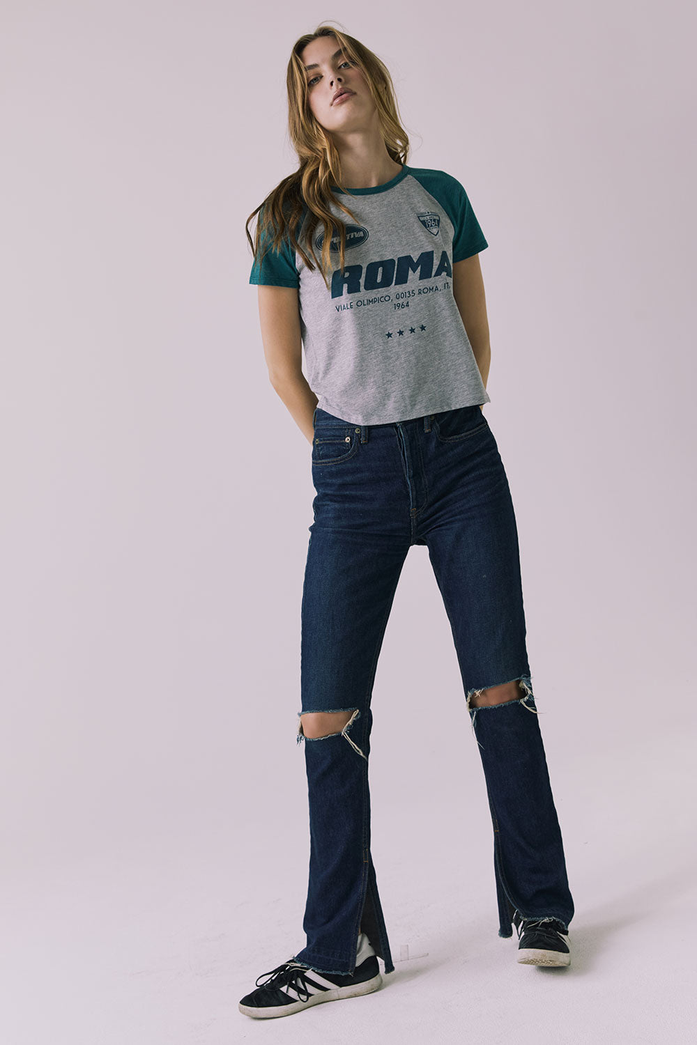 Full body view of the Chaser Sportiva Heather Grey Tee styled casually with denim for an everyday look