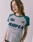 Waist-up view of the Chaser Sportiva Heather Grey Tee highlighting the Roma graphic and relaxed fit