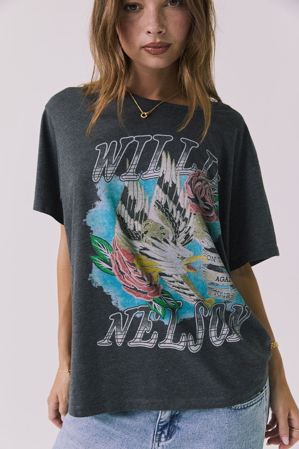Mid body view of the Chaser Willie Nelson On The Road Again Tee highlighting the vintage-inspired licensed band collaboration graphic and soft washed fab