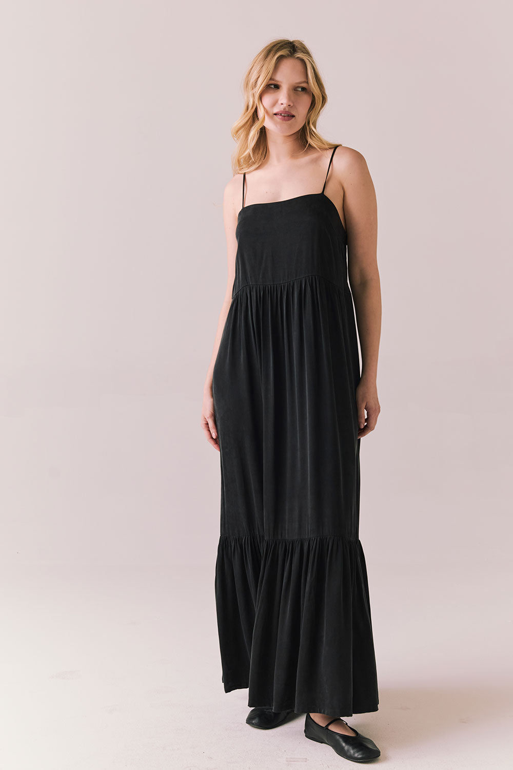 Full body view of model in Berkeley Maxi Dress in true black