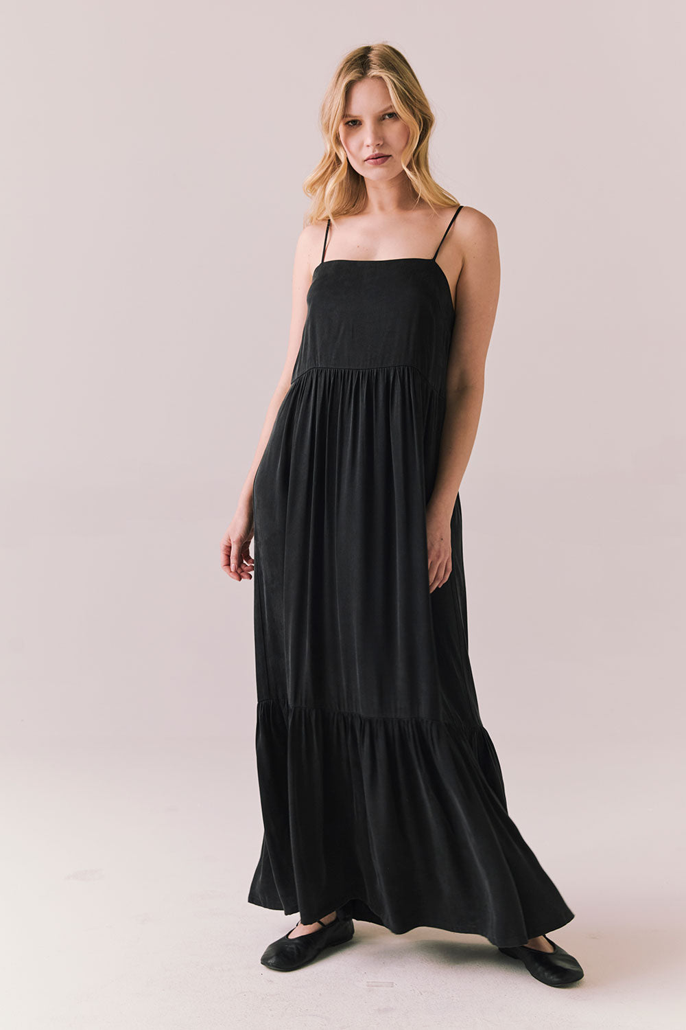 Full body view of model in Berkeley Maxi Dress in true black