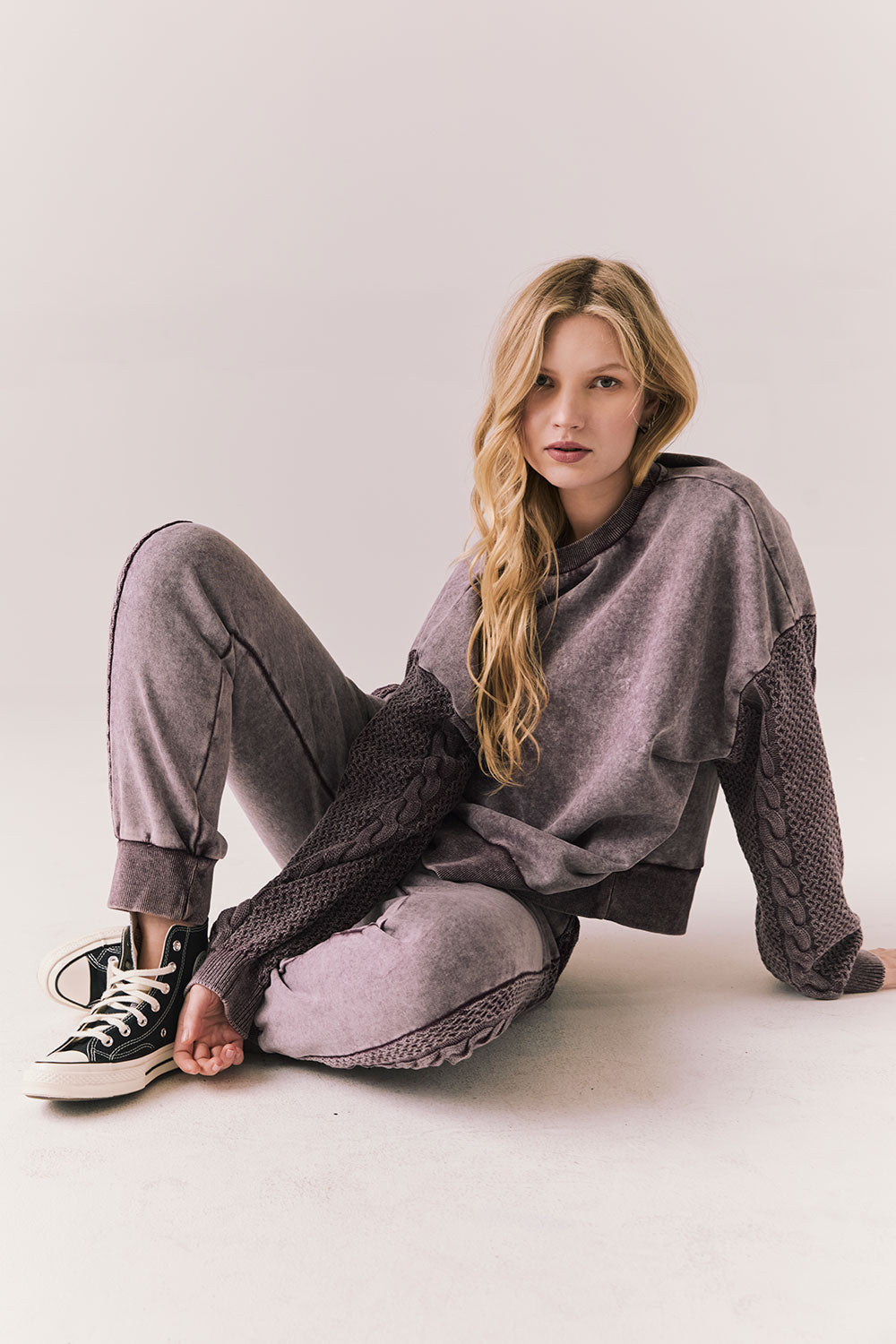 Full body view of model wearing fig Bay fleece joggers