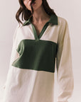 Woman wearing the color-blocked Chico Long Sleeve White and Green Rib Pullover  on a white background