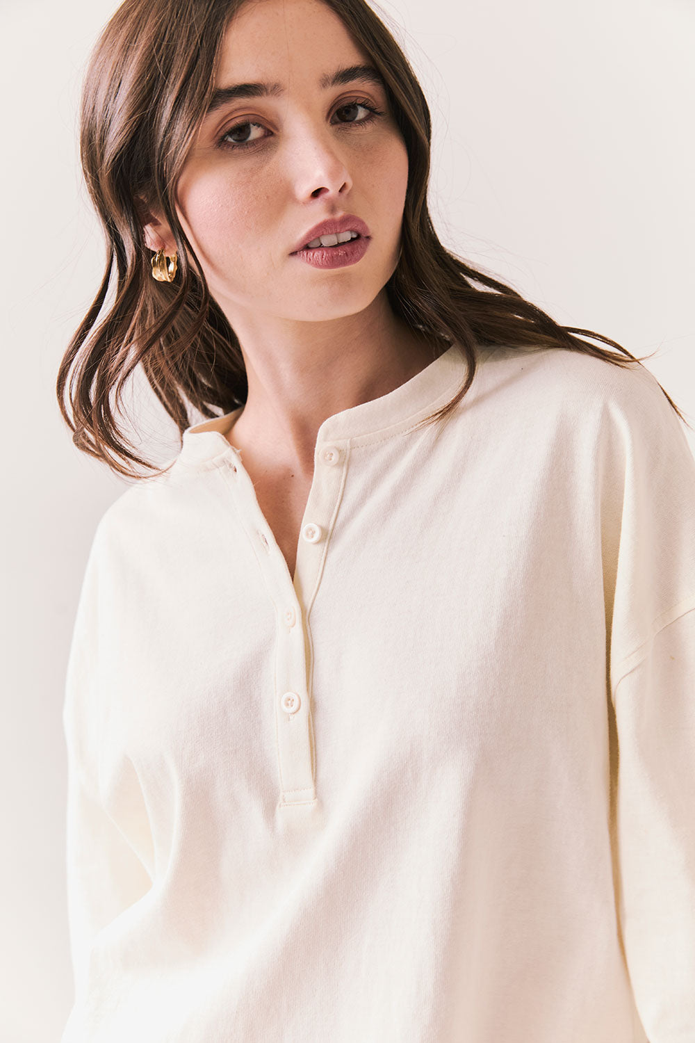 Front view of model wearing the Humboldt long sleeve in starry white with soft cotton texture against a white background