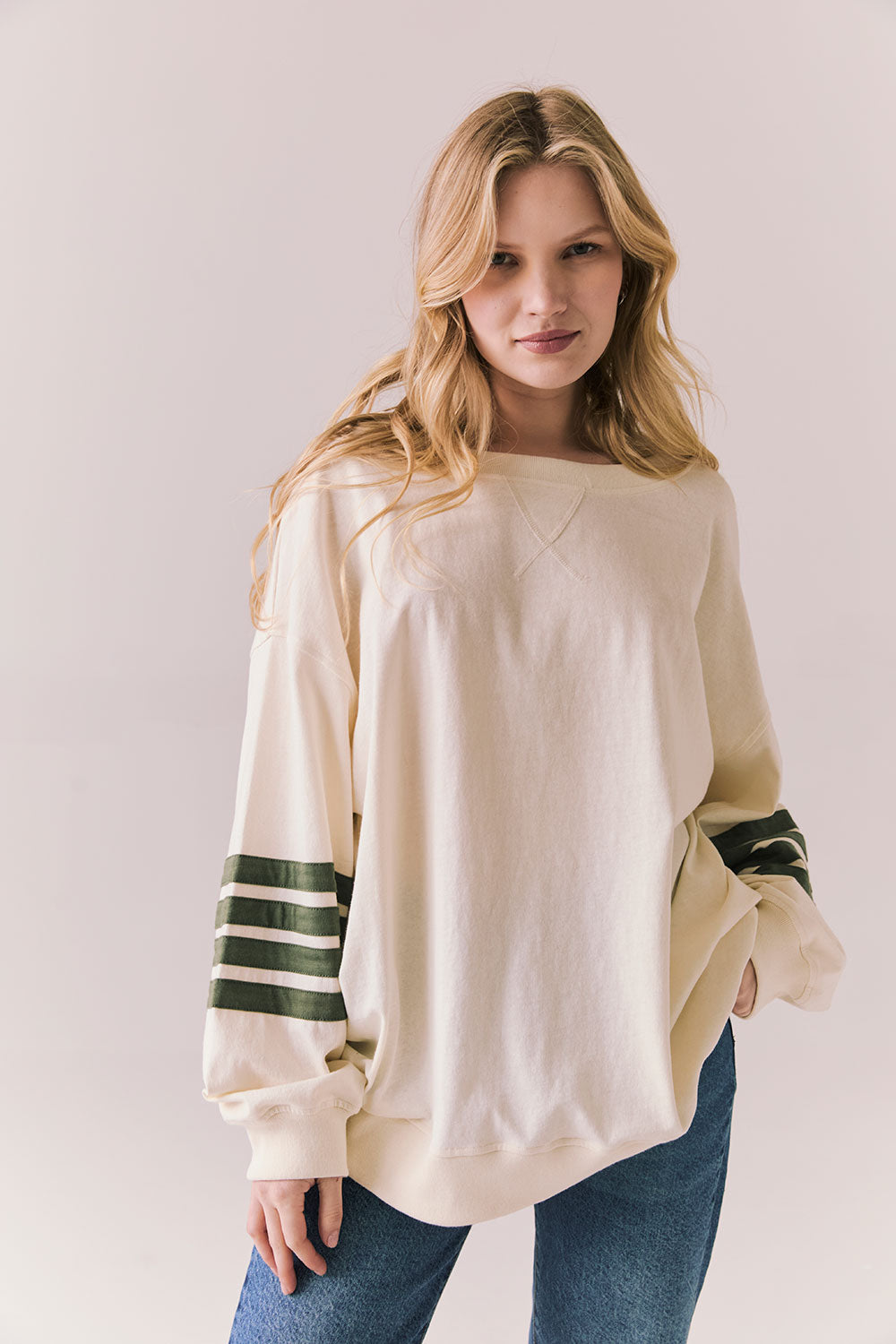 Front view of Pomona long sleeve in Starry White with Bronze Green stripes and gigot sleeves against a plain background
