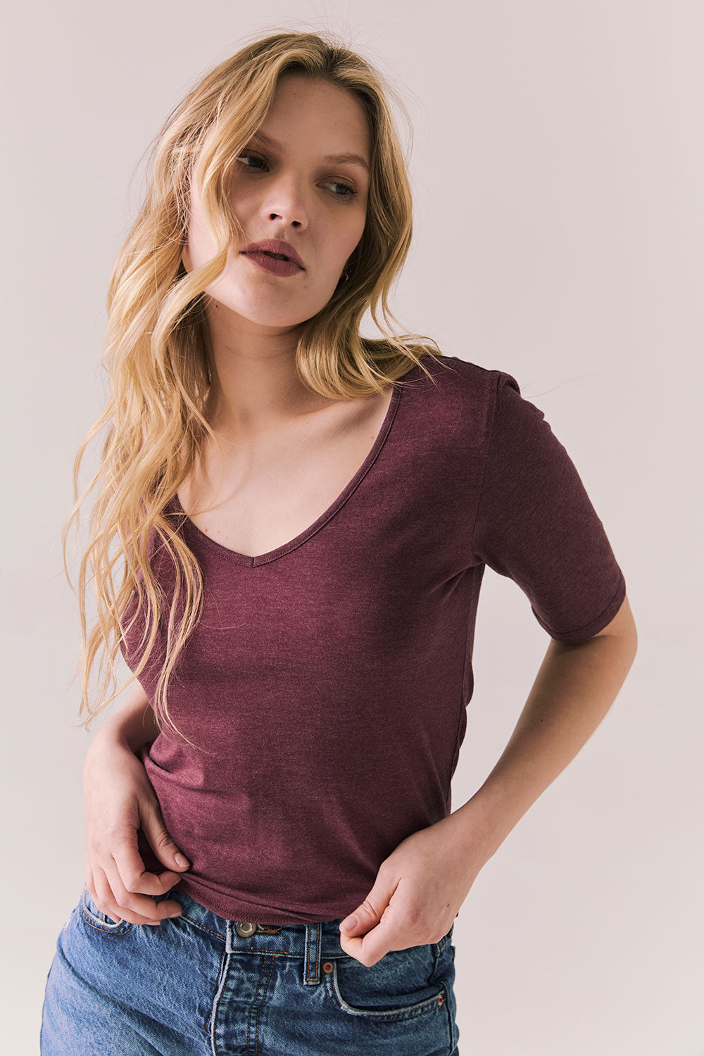 Front view of Fresno tee in fig with scoop neck and fitted silhouette on a plain background