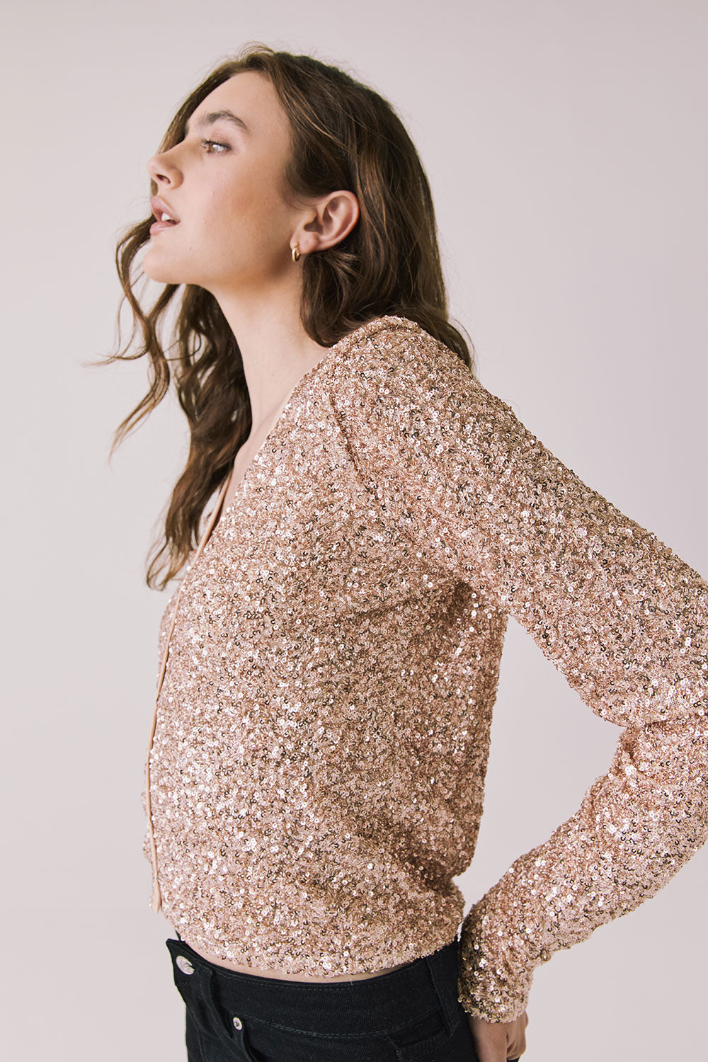 Side view of woman wearing Chaser’s Sparrow Bronze Brown Long Sleeve button-up on a white background