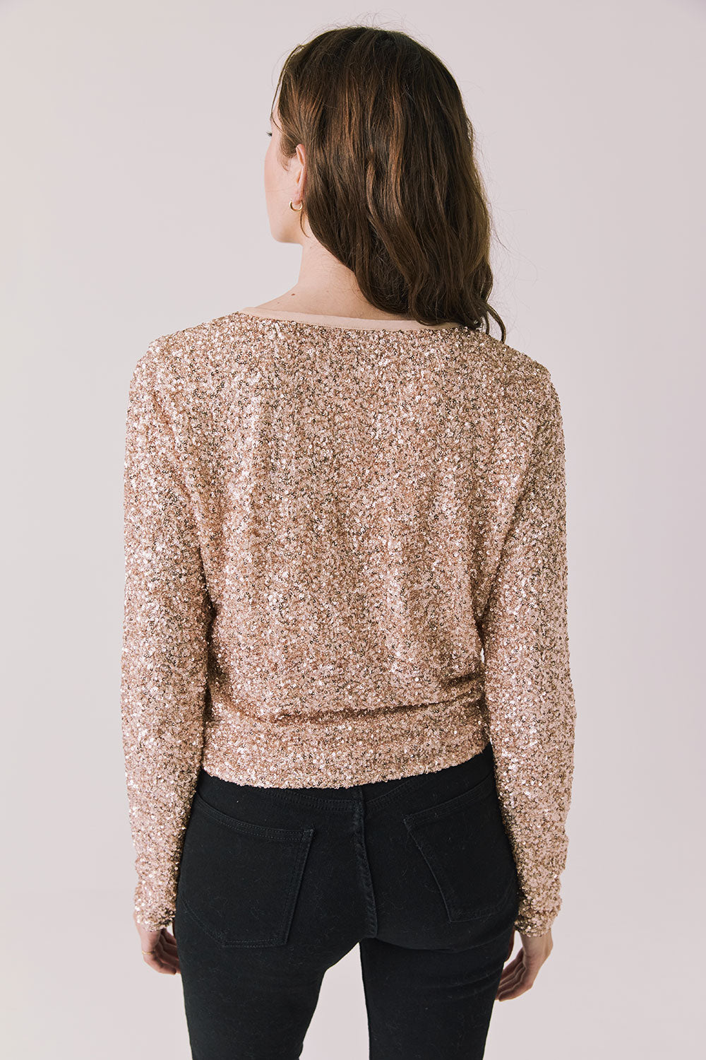 Back view of woman wearing Chaser’s Sparrow Bronze Brown Long Sleeve on a white background