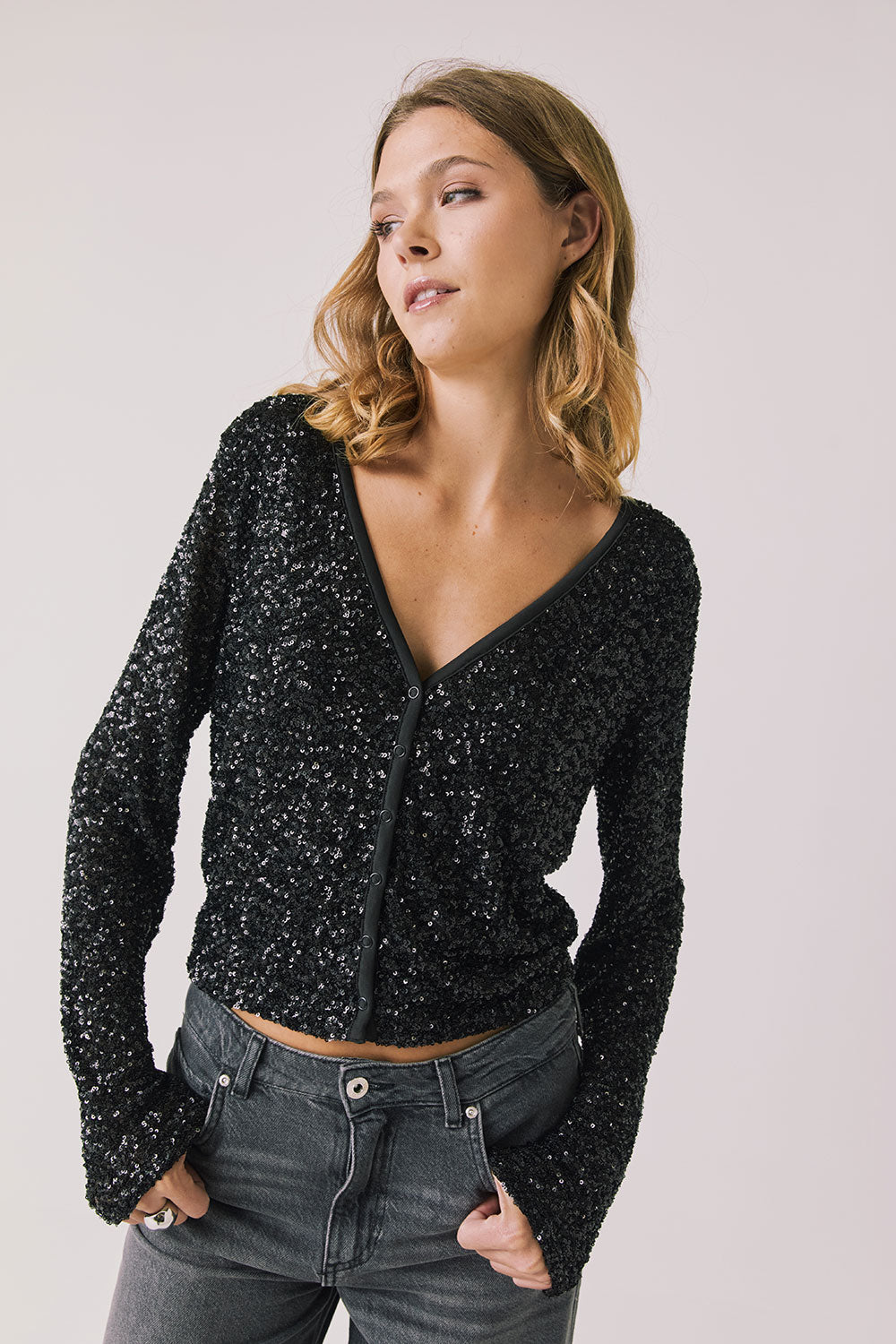 Front view of woman wearing Chaser’s Sparrow True Black Button-Up Long Sleeve on a white background