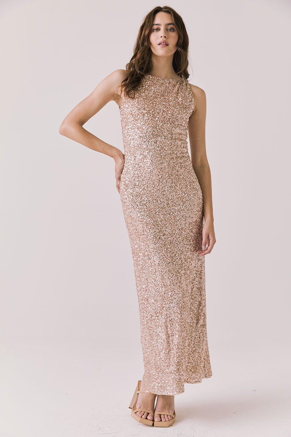 Full body view of woman wearing Chaser’s Faye Bronze Brown Dress on a white background