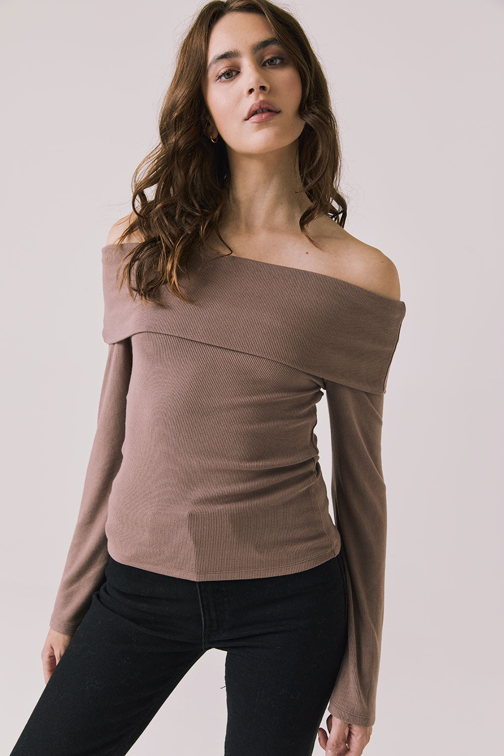Front view of woman wearing Chaser’s Pixie Deep Taupe Long Sleeve with off-shoulder design on a white background