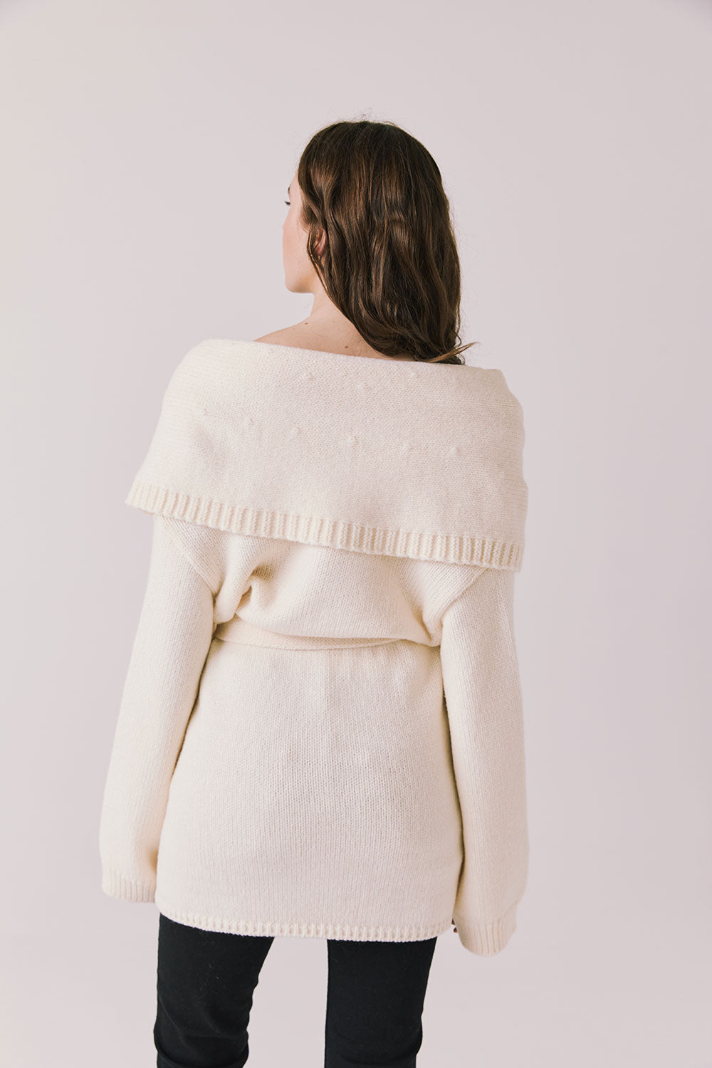 Back view of woman wearing Chaser’s Eclipse Warm White Cardigan Robe on a white background