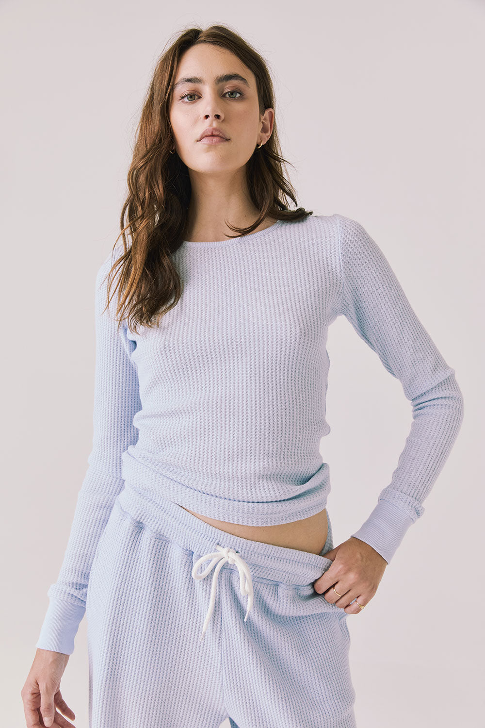 Front view of woman wearing Chaser’s Spritz Long Sleeve on a white background